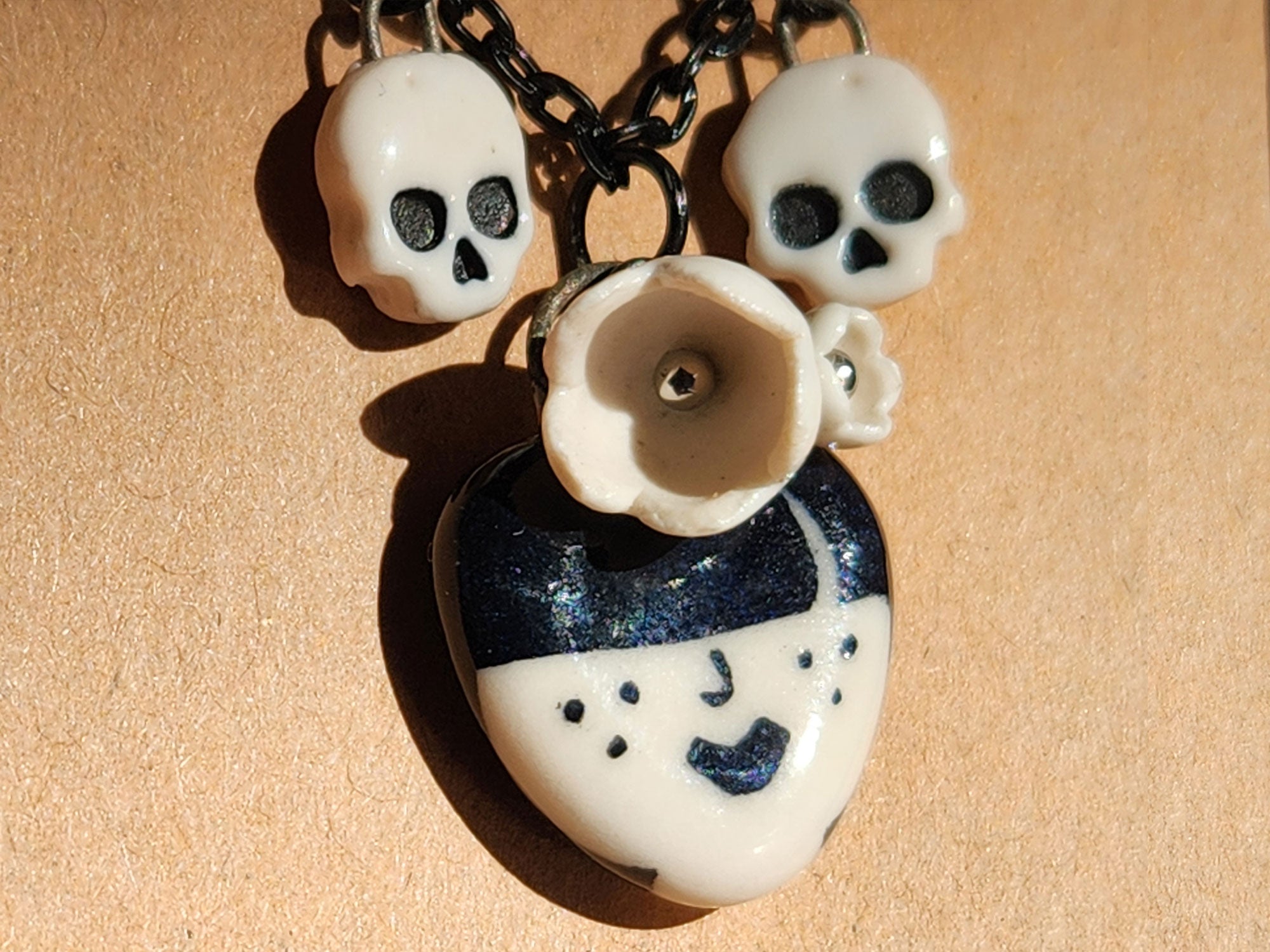 "Odessa" Gothic Charm Necklace - flowers and skulls, 20" black chain