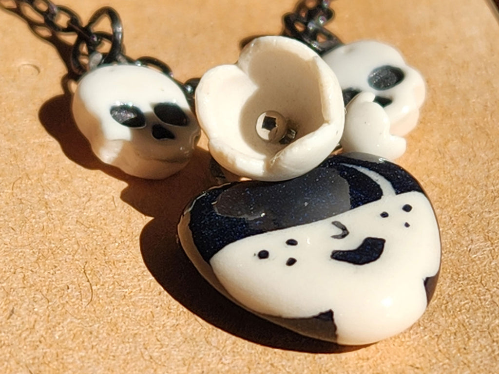 "Odessa" Gothic Charm Necklace - flowers and skulls, 20" black chain