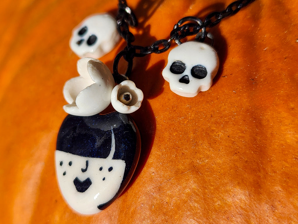 "Odessa" Gothic Charm Necklace - flowers and skulls, 20" black chain